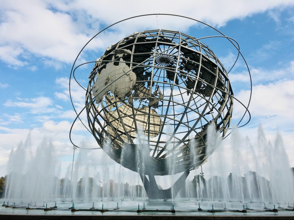 round silver ball on top of building