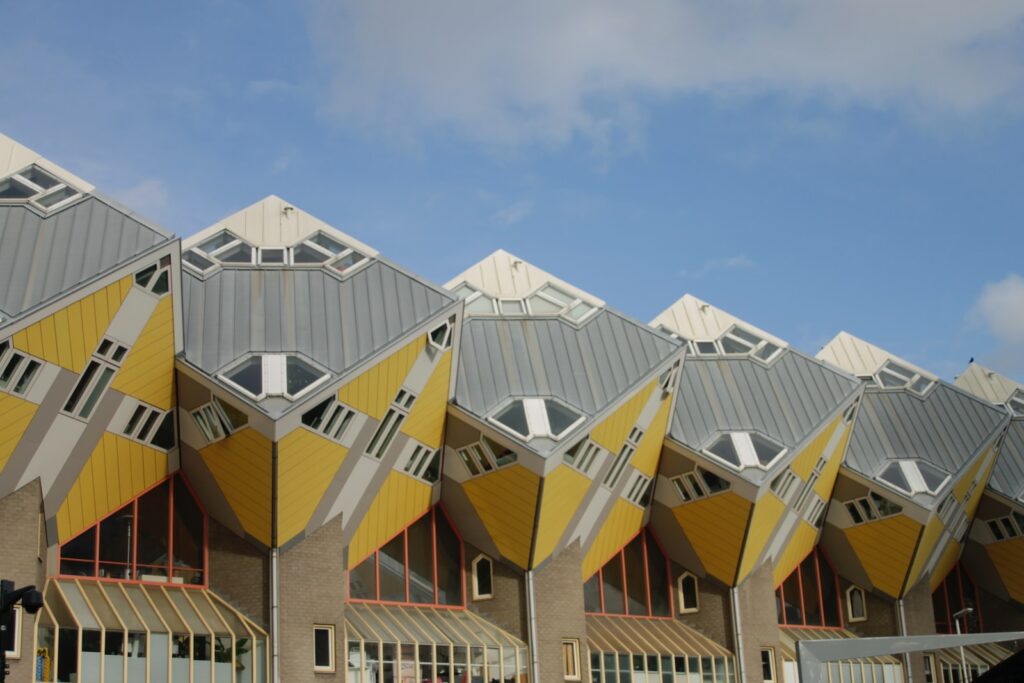 a row of buildings with a sky background